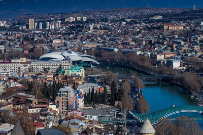 High angle view of city at river