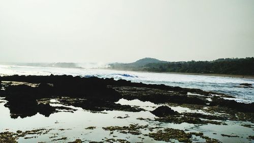 Scenic view of sea against clear sky