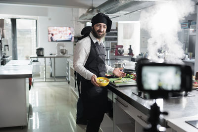 Portrait of young man working at home