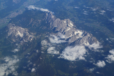 Aerial view of snowcapped mountains against sky