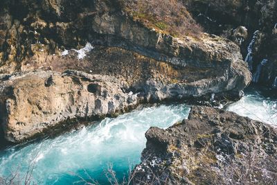 Scenic view of rocks in sea