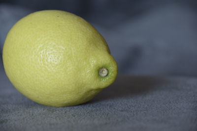 Close-up of lemon on table