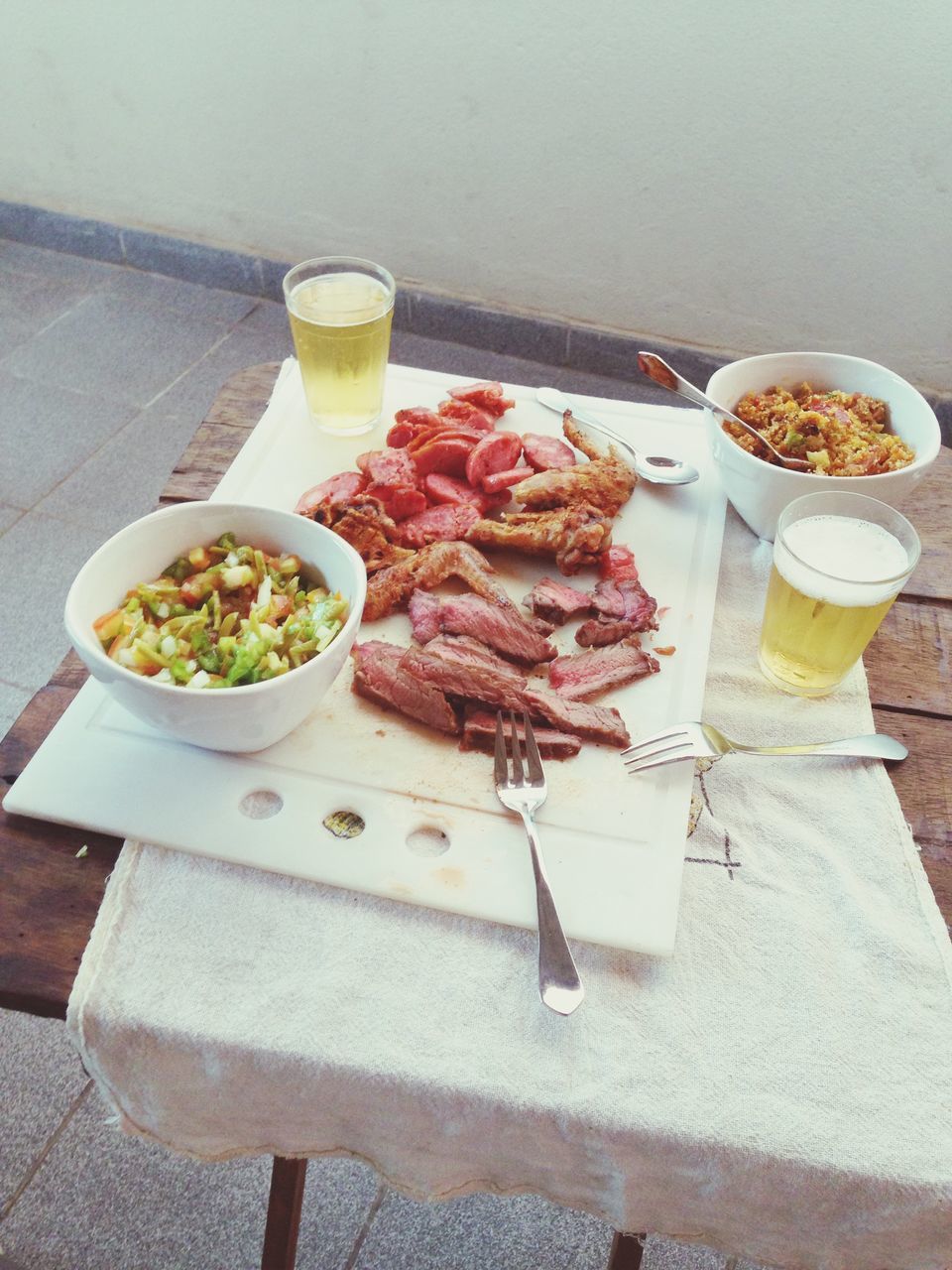 food and drink, food, freshness, table, indoors, plate, healthy eating, ready-to-eat, still life, high angle view, serving size, fork, meat, meal, served, bowl, drink, drinking glass, indulgence, salad