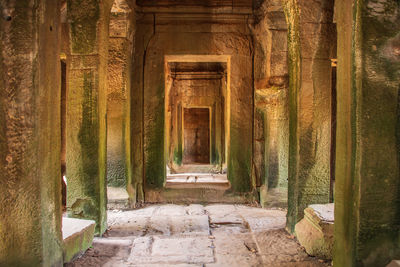 Hidden gunner in an angkor wat  temple