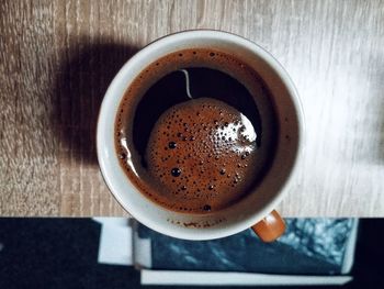 High angle view of coffee on table