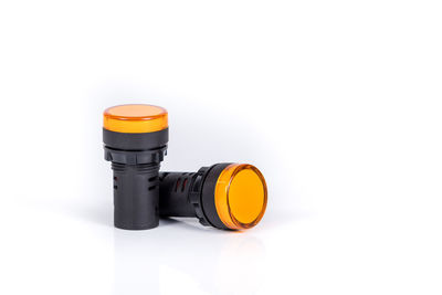 Close-up of yellow camera over white background