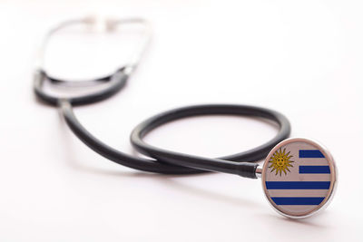 Close-up of stethoscope against white background