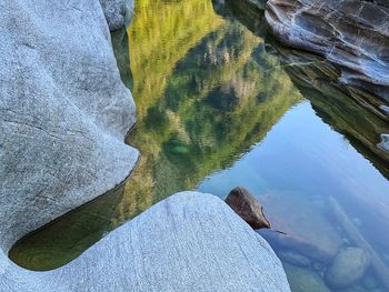 High angle view of lake amidst rock formation