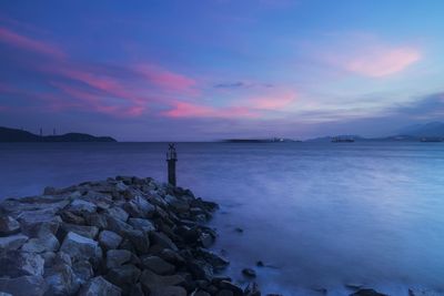 Scenic view of sea at sunset