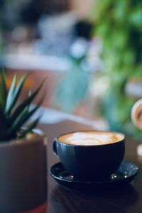 Close-up of coffee served on table