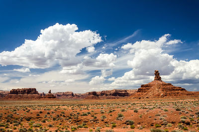 Panoramic view of arid landscape against sky