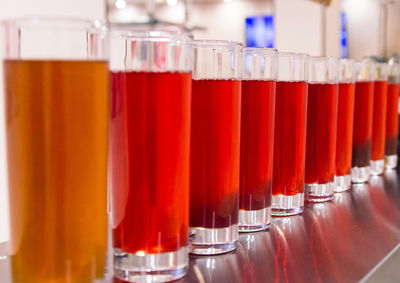 Close-up of red wine in glass on table