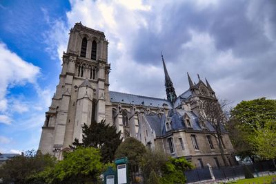 Low angle view of building against sky in city