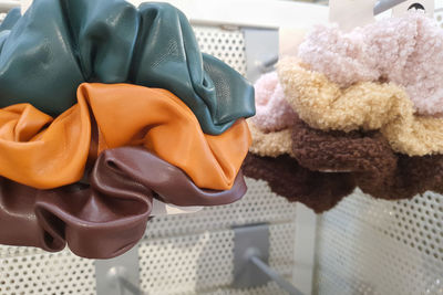 Set of trendy scrunchies, fluffy, satin and polyester fabric. closeup