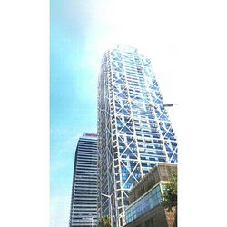 Low angle view of modern building against sky