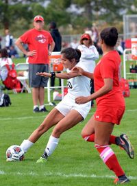 Group of people playing soccer