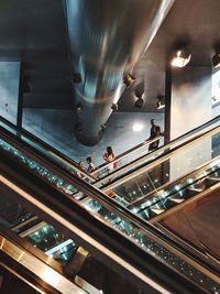 High angle view of people on escalator