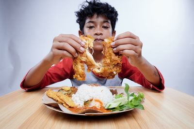 Close-up of girl eating food