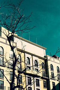 Low angle view of building against blue sky