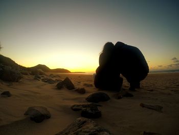 Scenic view of sea at sunset