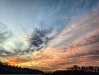 Low angle view of dramatic sky during sunset