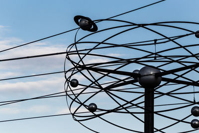 Low angle view of street light against sky