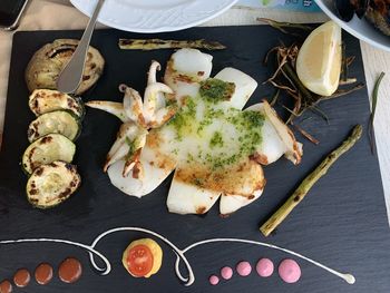 High angle view of food served on table