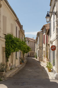 Walkway by road in town