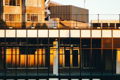 Low angle view of building against sky during sunset