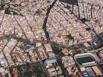 High angle view of illuminated buildings in city