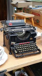 High angle view of old machinery on table