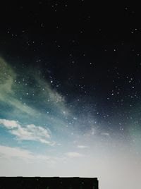 Low angle view of stars against sky at night