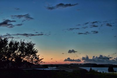 Scenic view of landscape against cloudy sky