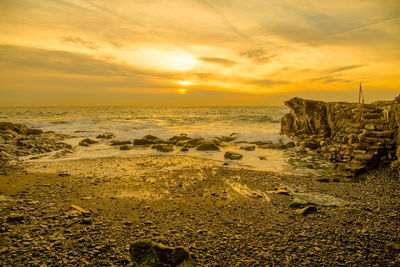 Scenic view of sea against sky during sunset