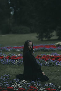 Woman looking at camera on field