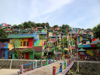 Houses against sky in city