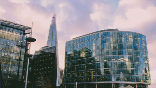 Low angle view of modern buildings against sky