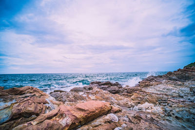 Sea with smooth wave and rock landscape. nature of seascape in vacation holiday travel relax time.