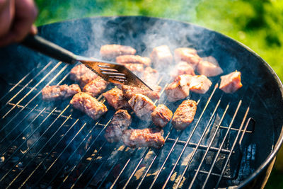 Close-up of meat on barbecue grill