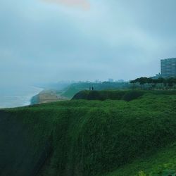 Scenic view of land against sky