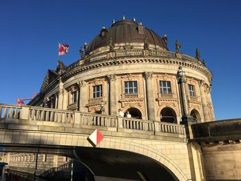 Low angle view of historical building against clear sky