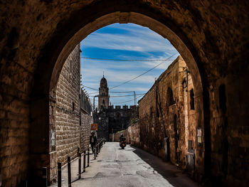 Buildings seen through archway