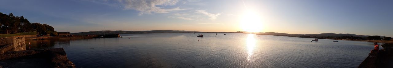 Panoramic view of sea against sky during sunset