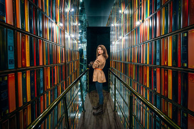 Young woman in room with optical illusion