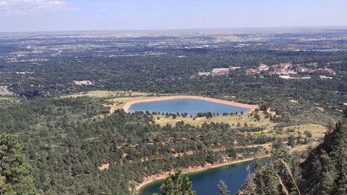 Aerial view of river amidst landscape against sky