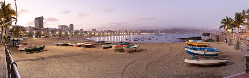 Panoramic views of the sunrise on las canteras beach in las palmas de gran canaria, spain.