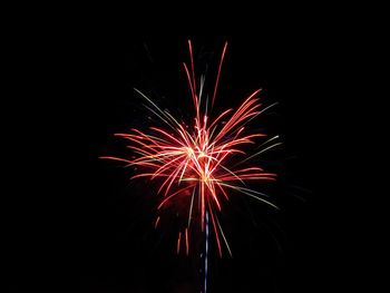 Firework display at night