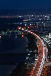 High angle view of illuminated city at night