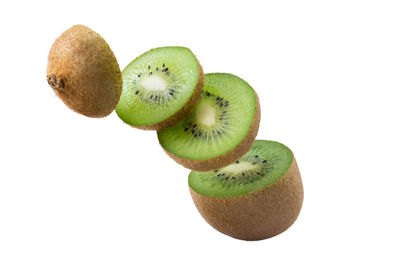 Close-up of fruits against white background