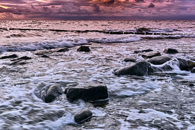 Scenic view of sea against sky during sunset